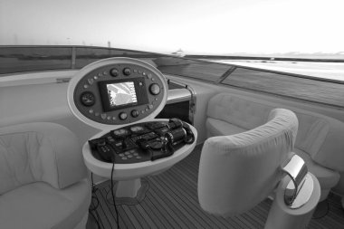 Italy, Fiumicino (Rome); 28 September 2005, MAIORA luxury yacht in the port, view of the flybridge and the cockpit at sunset - EDITORIAL