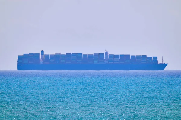 Italy, Sicily, Mediterranean sea; container ship in the Sicily Channel