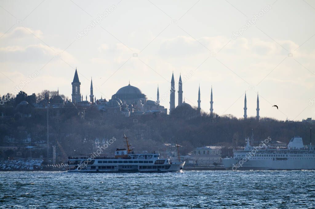 Turkey, Istanbul, view of city and the Blue Mosque from the Bosphorus channel at sunset