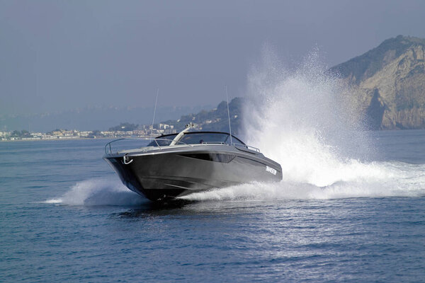 Italy, Liguria coastline, Mediterranean Sea; luxury yacht  