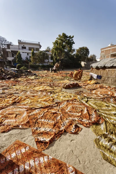 Indian sarongs drying under the sun — Stock Photo, Image