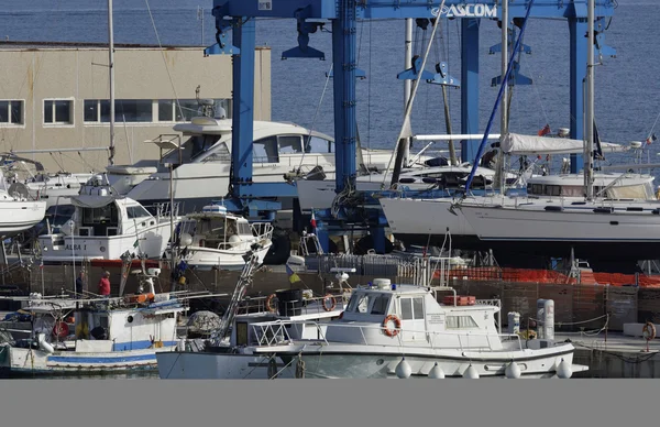Fishing boats and luxury yachts in the marina — Stock Photo, Image