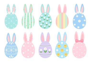 Beyaz arka planda pastel renkli tavşan kulaklı Paskalya yumurtaları koleksiyonu.