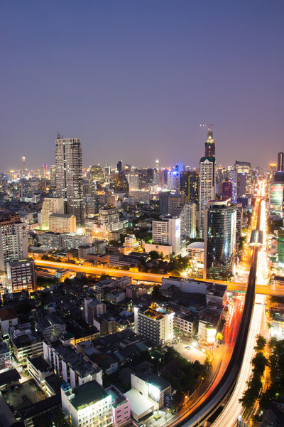 BANGKOK, THAILAND-APRIL 9 : Wonderful twilight at Sathorn in Bangkok on April 9, 2015. Bangkok skyline view from Sathorn unique tower city of Thailand.