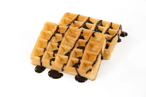 Zwei belgische Waffeln mit Schokolade auf einem bläulichen Teller, isoliert auf weiß — Stockfoto