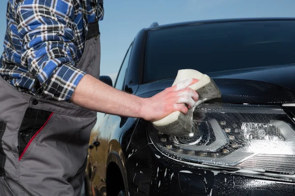 Car floodlight cleaning — Stock Photo, Image