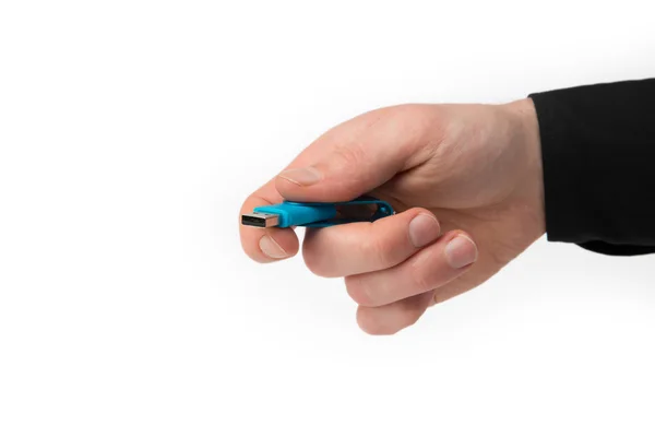 Uma mão isolada com um stick USB — Fotografia de Stock