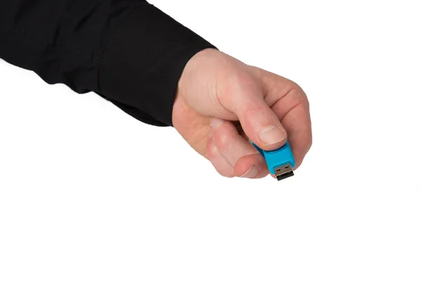 Azul USB Stick en una mano, aislado en blanco — Foto de Stock