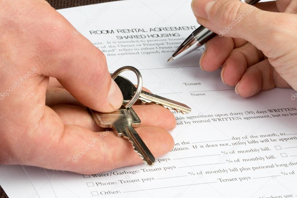 Room Rental agreement document with keys and pen