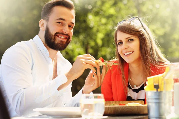 Young couple in restaurant — Stock Photo, Image