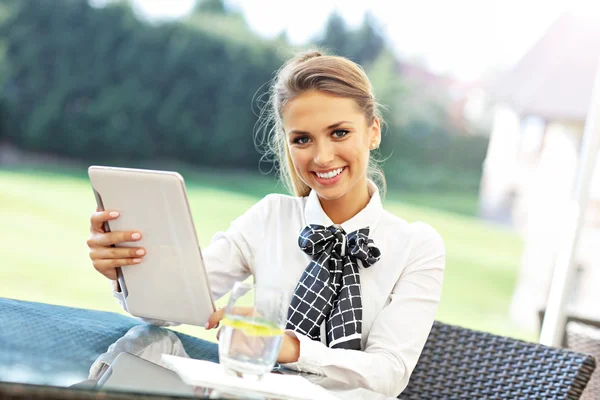 Young manager working in cafe — Stock Photo, Image