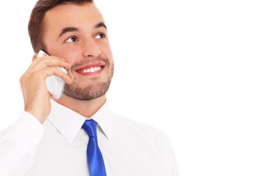 İş adamı telefonda konuşuyor.