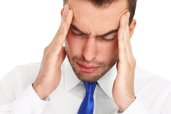 Affärsman som lider av huvudvärk — Stockfoto