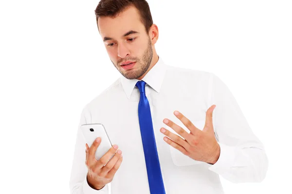 Hombre de negocios enojado con un teléfono — Foto de Stock