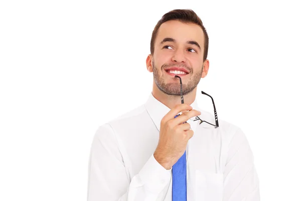 Young businessman thinking over white background — Stock Photo, Image