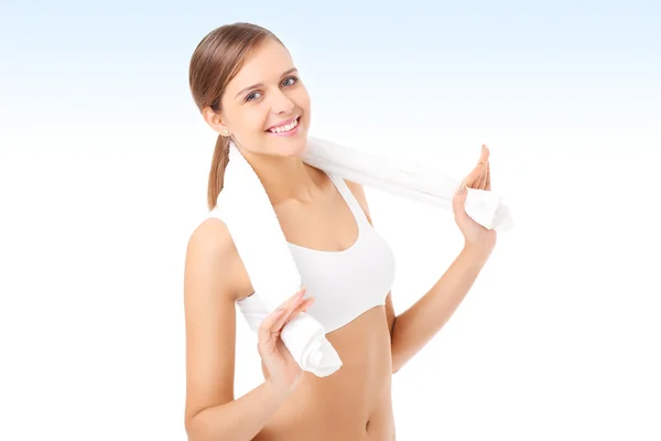 Fit woman with towel — Stock Photo, Image