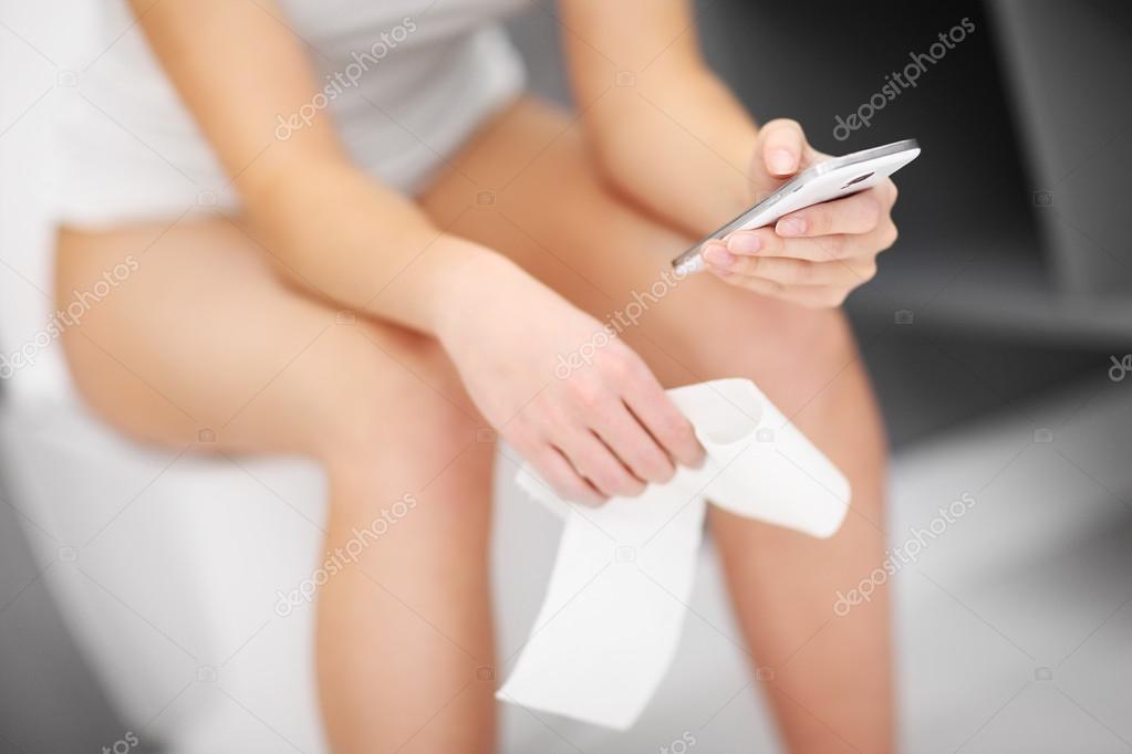 Woman having problem in toilet