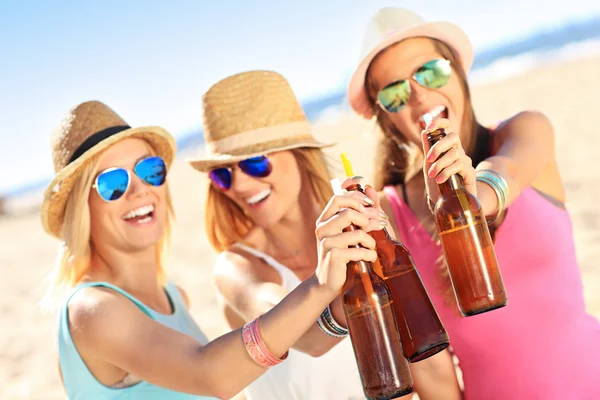 Girl friends on picnic on the beach — Stock Photo, Image