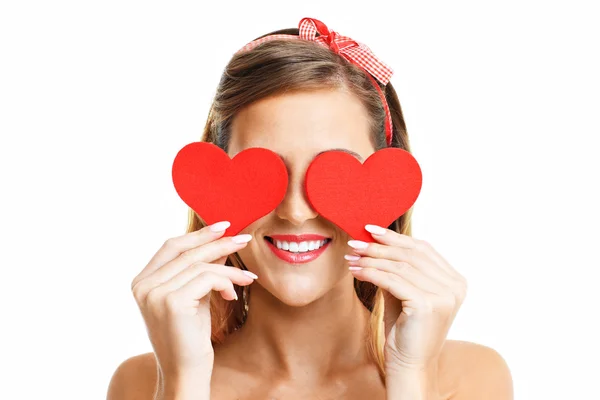 Sexy San Valentín mujer sosteniendo corazones —  Fotos de Stock