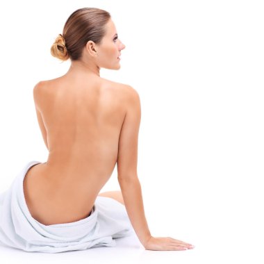 Şehvetli kadın beyaz bir havlu