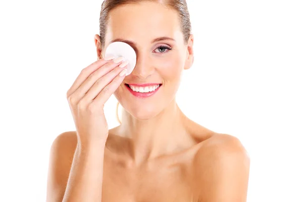 Sensual woman removing makeup — Stock Photo, Image