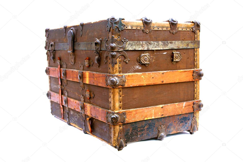 Steamer Trunk. An antique Steamer Trunk. Isolated on white. Room for text. Steamer Trunks have been used as luggage for years to protect and move clothes and items while traveling the country or the world. 