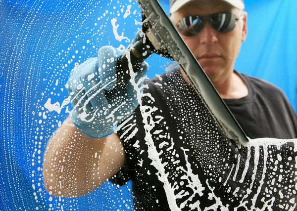 Man Washes Windows Squeegee Soapy Water Window Washer Washes Cleans — 스톡 사진