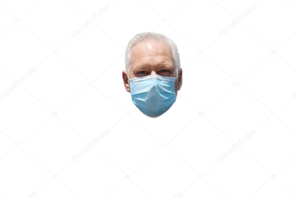Man wearing a paper mask on his face. A man wears a Medical Face Mask to help avoid contracting Coronavirus aka Covid-19. Covid-19 is an Airborne Illness which has spread world wide. Wear a mask, save a life. Covid-19 Poster. 