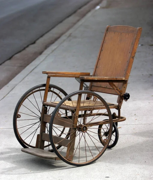 antique wheelchair. Vintage Wheel Chair.
