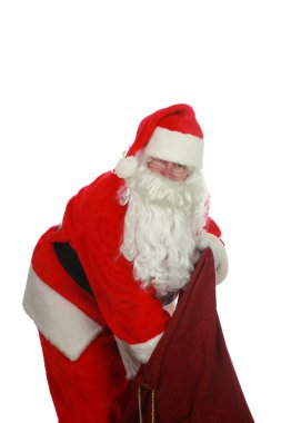 Noel Baba. Noel Baba beyazı izole etti. Mesaj için yer var. Noel Baba, Noel portresi için beyaz bir duvara poz veriyor. Kesme yolu. Noel Baba HO HO diyor. Mutlu noeller. Herkese mutlu yıllar..