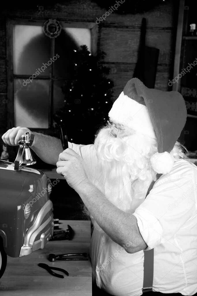 Santa's Workshop in the north pole. Santa in his workshop making new toys for Christmas Presents for children around the world. SANTA'S WORKSHOP. 