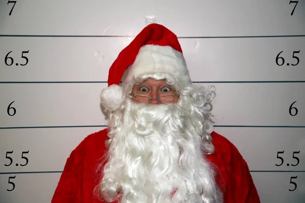 Santa Claus Mug Shot Santa Claus Mug Shot Санту Заарештовують — стокове фото