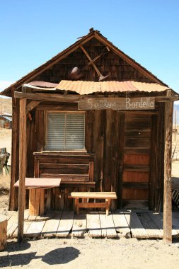 Ghost Town. Abandoned Gold Mining Town. ghost town in the desert. the wild wild west. Ghost town in the Wild West. Mining Town now abandoned when the gold rush ended. Long Lost American West. History of the American West in Arizona and California.  clipart