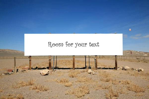 billboard. a Bland billboard in the desert. room for your text or images. death valley blank billboard. Billboard - Large Blank Billboard with empty screen and beautiful cloudy sky for outdoor advertising poster. Blank banner for your advertisement.