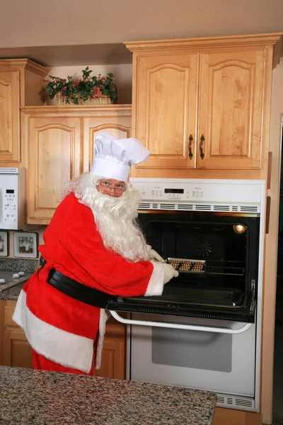 Der Weihnachtsmann Backt Plätzchen Weihnachtsplätzchen Der Weihnachtsmann Ist Sehen Wie — Stockfoto