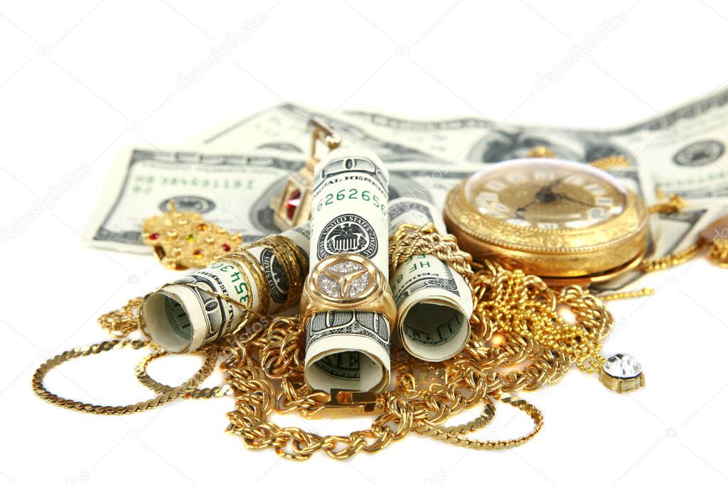 Cash For Gold. Cash 4 Gold. old jewelry on the money. Cash for Old Gold Jewelry and Diamonds. Cash with old gold in a leather pouch. Isolated on white. Room for text. Clipping path. leather pouch filled with gold jewelry lays upon a pile of cash. 