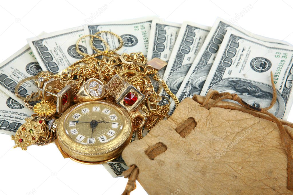 Cash For Gold. Cash 4 Gold. old jewelry on the money. Cash for Old Gold Jewelry and Diamonds. Cash with old gold in a leather pouch. Isolated on white. Room for text. Clipping path. leather pouch filled with gold jewelry lays upon a pile of cash. 