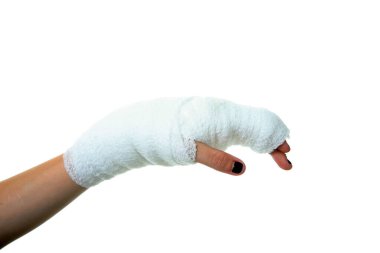 Sargı bezli eli bir kadın. Beyaz üzerine izole edilmiş. Mesaj için yer var. Kesme yolu. Kadının bandajlı eli. Kadının bandajlı eli. Yaralı el. İlk yardım. Bandaja sarılmış. Bileğim burkuldu. Kırık bilek. Kırık El. Tıbbi bandaj. İş yerinde yaralanmış. Acı..