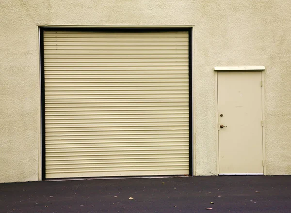 Roll Up Door. Garage Door. Warehouse Door. Building Roll Up Door. Generic Roll Up Door. Garage or Warehouse with a Roll Up Door. Building entrance with a large steel security door. Los Angeles California uses roll up doors to keep things safe.