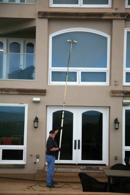 Window Cleaning. Window Washing. Window Washing Service. A professional Window Cleaner washes and rinses windows with Di Ionized Spot Free Water for a Squeekie Clean Service. Window Washing with a extension pole. For a Spot Free Wash and Rinse! 