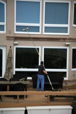 Window Cleaning. Window Washing. Window Washing Service. A professional Window Cleaner washes and rinses windows with Di Ionized Spot Free Water for a Squeekie Clean Service. Window Washing with a extension pole. For a Spot Free Wash and Rinse! 