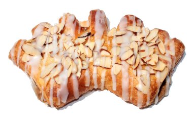 Ayı Pençesi. Ayı Pençeli Donut. Çörekler. Beyaz üzerine ayı pençesi çöreği. Beyaz üzerine izole edilmiş. Ayı pençesi şeklinde bir maya çöreği. Elma meyveli donut ve şeker jölesiyle kaplı. Bademli Ayı Pençeli Donut. Ayı pençesi çöreği. Özel donutlar. Cilalı. 