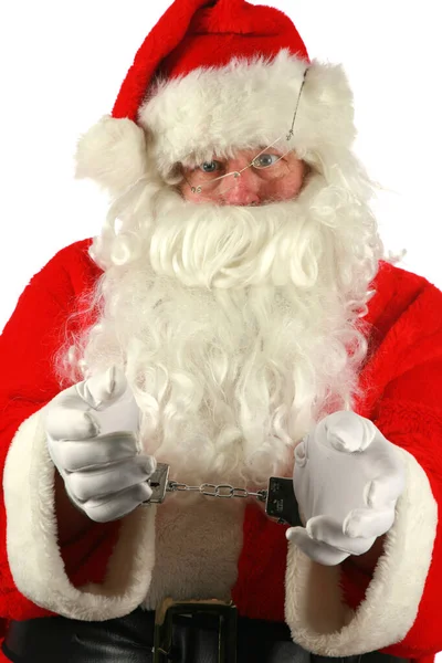 有趣的圣诞节 圣诞老人被逮捕了圣诞老人穆格开枪了 圣诞老人戴手铐时被人用杯子射中了照片 圣诞老人今年过得很糟糕 坏圣诞老人圣诞老人穆格开枪了 圣诞老人圣诞节 圣诞老人被捕了孤立的 — 图库照片
