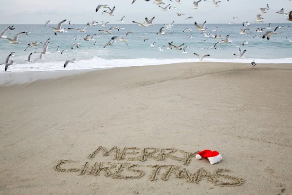 Christmas Merry Christmas Words Merry Christmas Written Sand Beach Santa — Fotografia de Stock