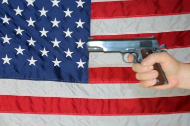 Gun. American Flag. .45 caliber pistol with an American Flag background. 2nd Amendment. Second Amendment. Represents 2nd Amendment. the right to bare arms. Civil Liberty. Personal Protection. Protection of life and property. Gun Control. Pistol. 