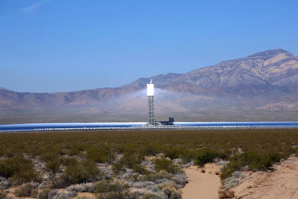 Solar Farm. Industrial Solar Power Collector Site. Solar Power Electricity Manufacturing Company. Solar Panels.  Sun power. a rural solar farm. A Solar Farm in Nevada. Solar Farm in the Hot Dry Desert of Nevada USA. Solar Power Station. Sunlight.