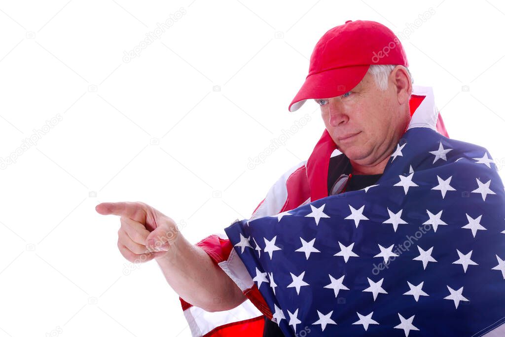 Proud American. America. American Flag. American Man. Isolated on white. Room for text. Patriotic American. Clipping Path. A man wrapped in a large American Flag. Fourth of July. 4th of July. Independence Day. Flag Day. Veterans Day. American Holiday