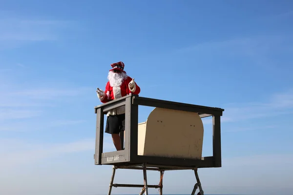 Різдво Санта Клаус Santa Claus Life Guard Santa Life Guard — стокове фото