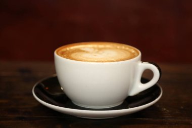 - Kahve. Latte Art. Üstünde köpük olan Hot Rich Latte Art ile kahve. Kahve ve Latte Kahve dünyanın en popüler içeceğidir. Kahveli sütlü kahve. Kahve üzerine Latte Art, profesyonel barista sanatçısından. Sıcak Latte. İç.. 