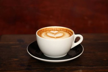 - Kahve. Latte Art. Üstünde köpük olan Hot Rich Latte Art ile kahve. Kahve ve Latte Kahve dünyanın en popüler içeceğidir. Kahveli sütlü kahve. Kahve üzerine Latte Art, profesyonel barista sanatçısından. Sıcak Latte. İç.. 